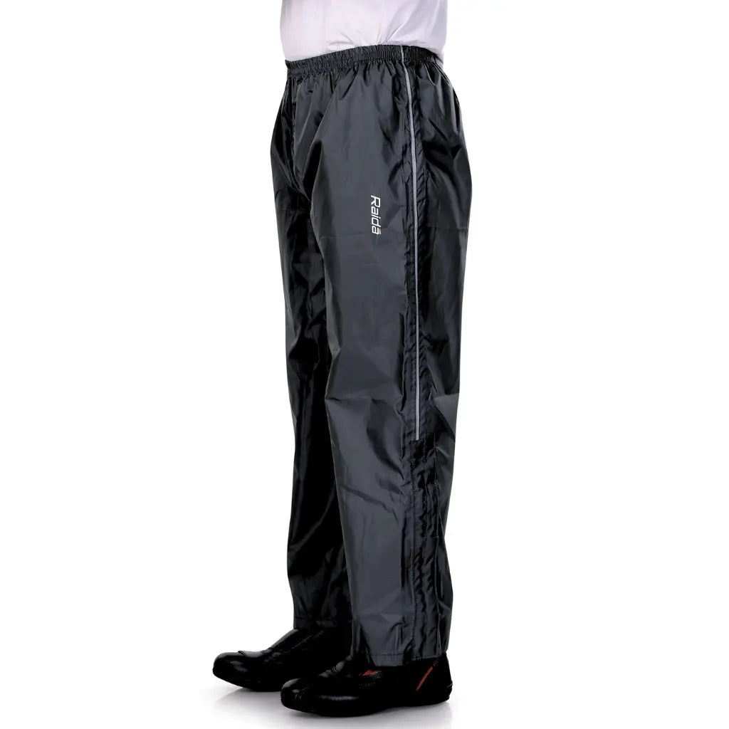 Raida Drymax Rainpants in Black Color – Waterproof Overpants With Reflective Safety & Boot-Friendly Fit, Best Raincoat pants for Bike Riders, Best Waterproof Rain Pants in India for Long Touring, Road Trips, Bike Rides