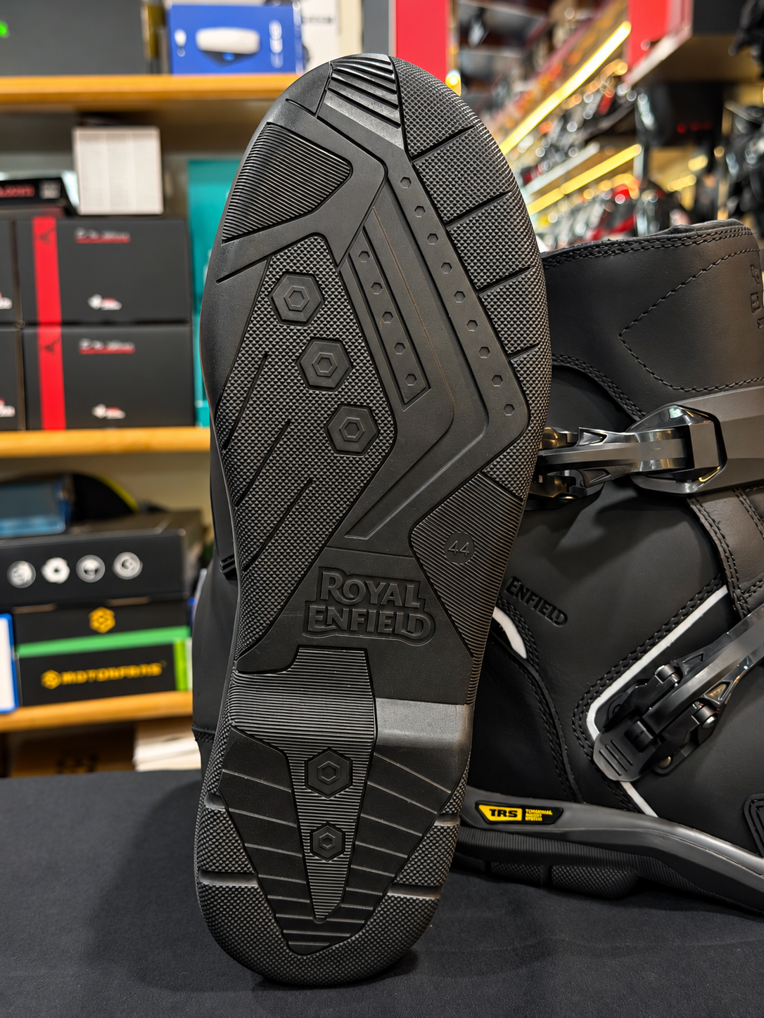 Royal Enfield Wanderer riding boot outsole showing patterned tread, embossed branding and EU size 44 marking.